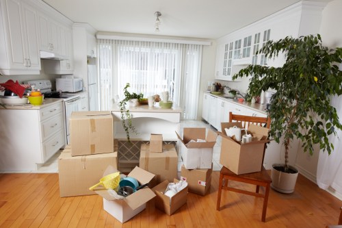 Removal team preparing equipment for a safe house move