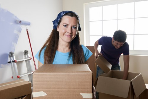 Staff assessing moving hazards before loading furniture
