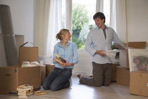 Moving team handling a flat move in a busy Harrow area