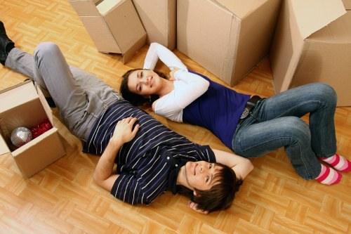 Professional moving truck loading furniture in Harrow
